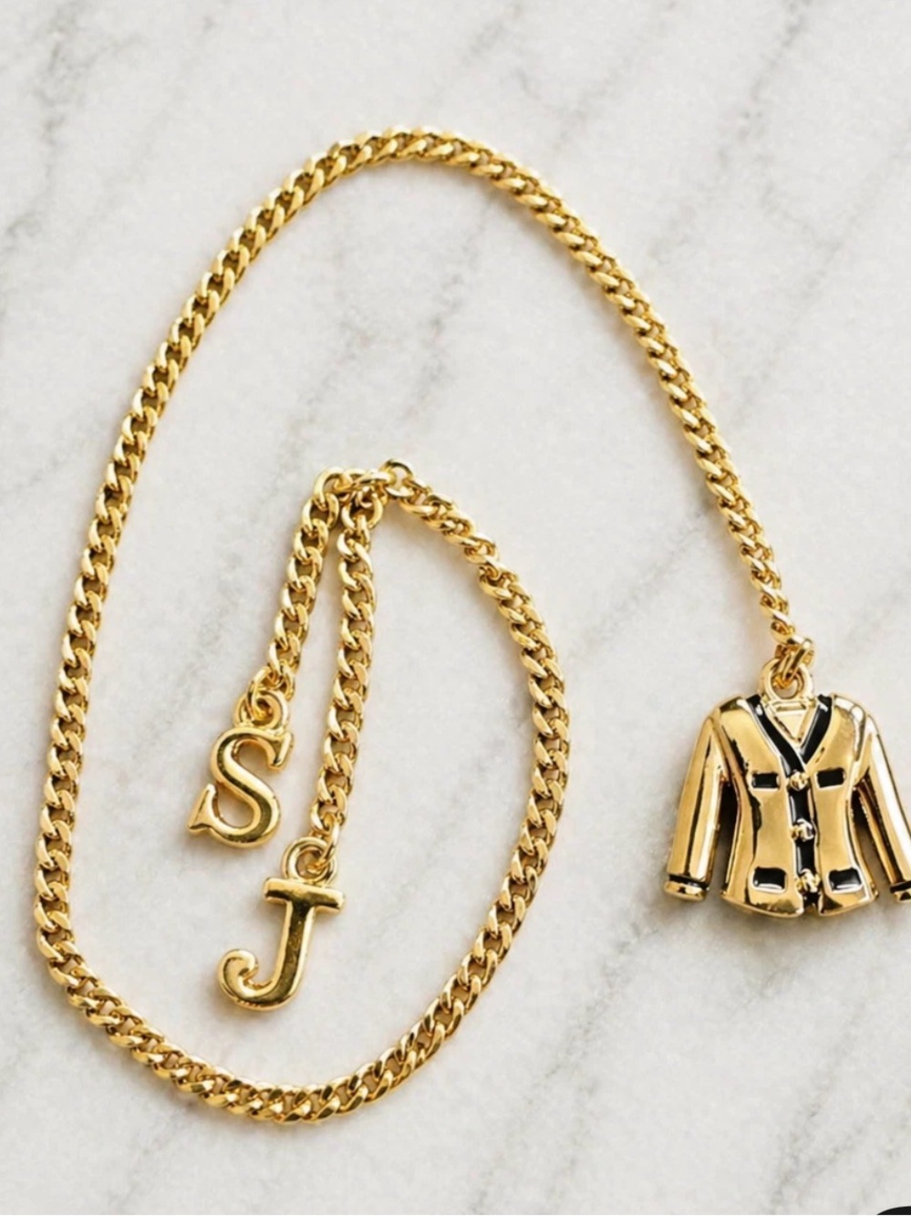 St. John Gold Jacket Pendant Jacket Charm accessory.